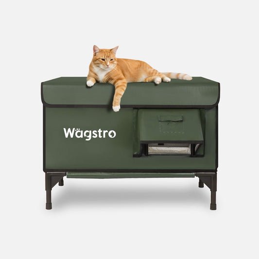Close-up view of the Wägstro heated cat house heating mat and soft cushion, showing temperature control and comfort materials.
